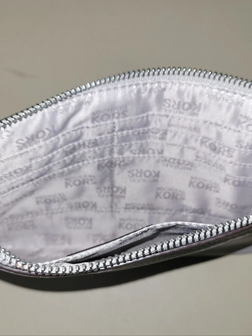 Michael Kors Grey Pebbled Leather Wristlet with Silver Logo